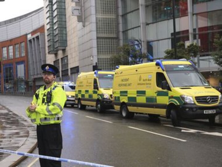 Four injured in stabbing at Manchester shopping mall; suspect in custody of counter-terror police, inquiry on
