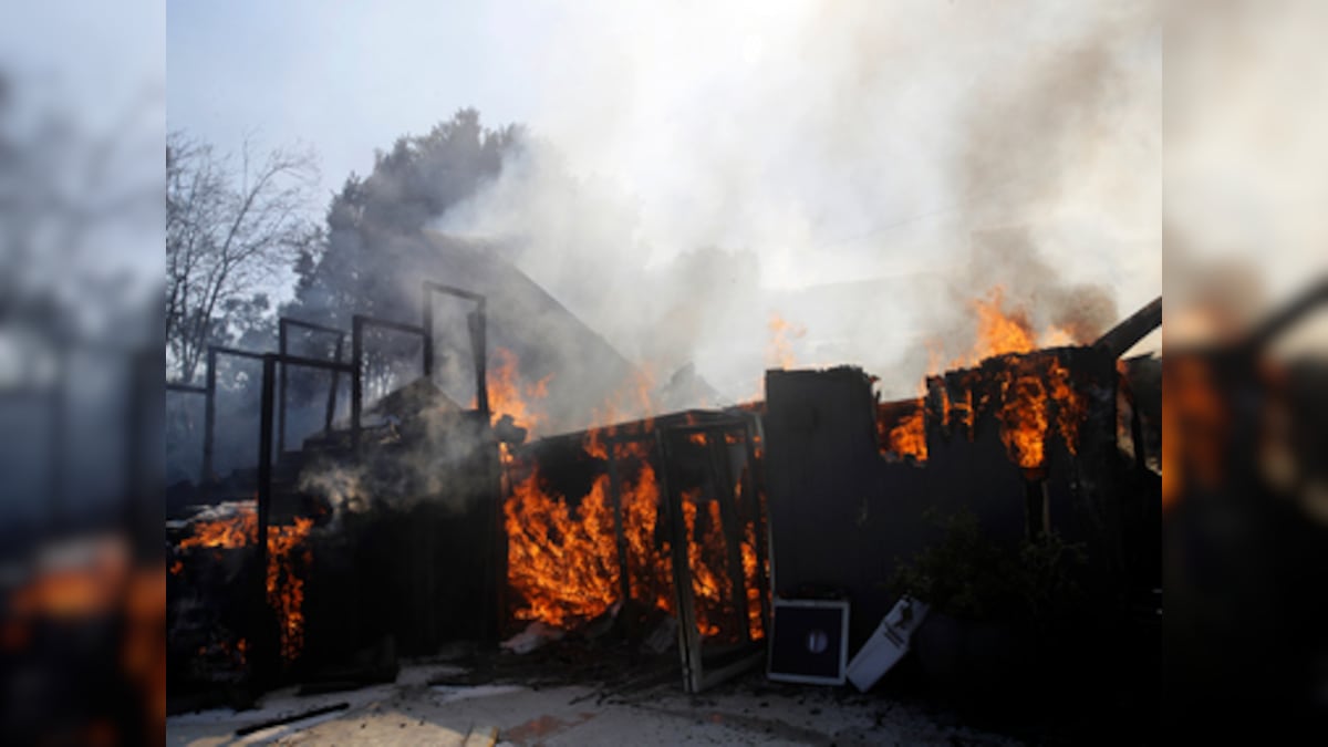 California wildfire: Blaze sweeps through hills of Los Angeles; several homes destroyed, celebrities among those who fled for safety