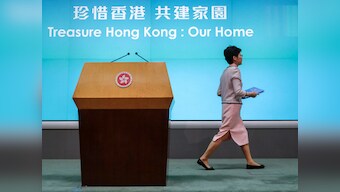 Hong Kong protests: Opposition lawmakers dragged from legislative chamber as city leader Carrie Lam heckled for second day