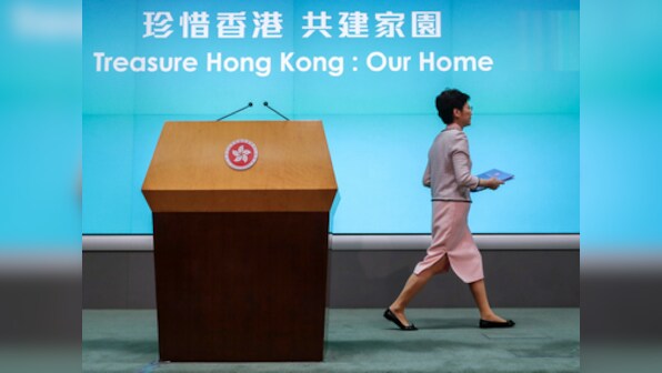 Hong Kong protests: Opposition lawmakers dragged from legislative chamber as city leader Carrie Lam heckled for second day