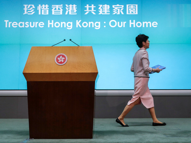 Hong Kong protests: Carrie Lam abandons policy speech as Oppn shouts her down; agitation leader hospitalised after facing attack Hong Kong protests: Carrie Lam abandons policy speech as Oppn shouts her down; agitation leader hospitalised after facing attack