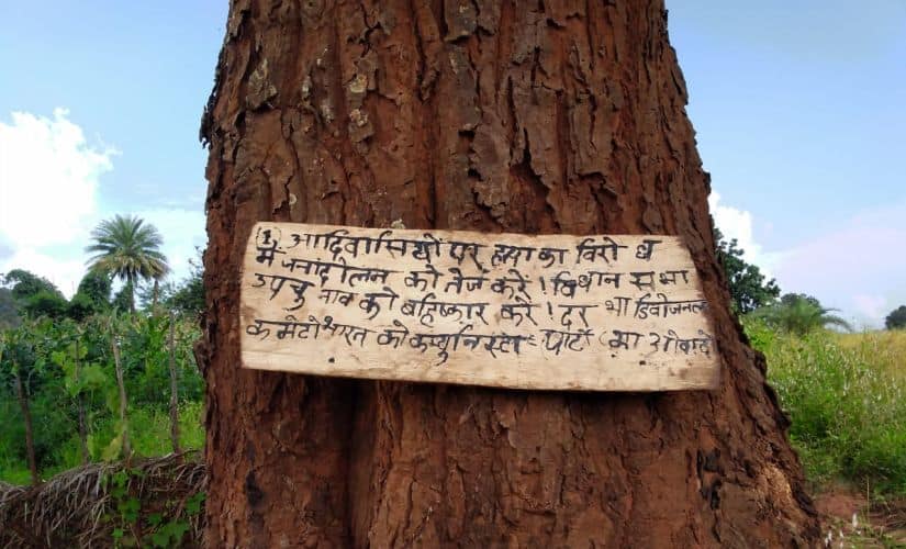 Maoists have asked villagers to boycott Chitrakot bye-election through a handwritten notice on a wooden board nailed on a tree trunk. Firstpost/Debobrat Ghose