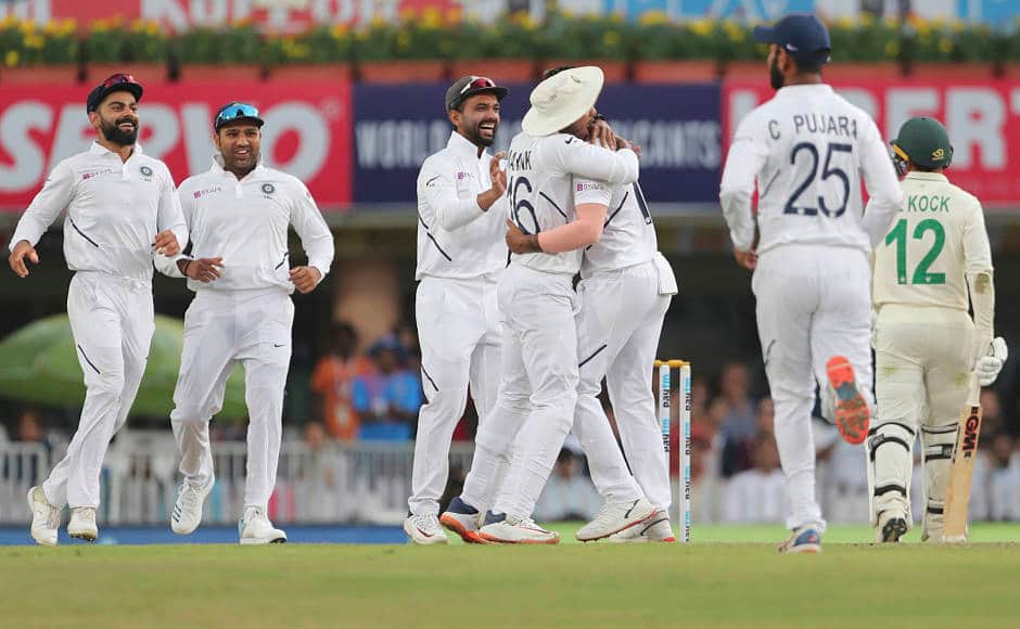 Umesh Yadav celebrates the dismissal of Quinton de Kock as the Proteas lost two wickets early in their reply. With play being called off early on Day two due to bad light, the visitors are 9 for the loss of two wickets, trailing by 488 runs. AP 