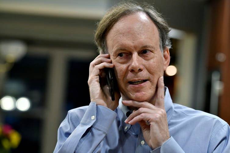 William G. Kaelin, Jr. talks to a reporter after being awarded the Nobel Prize for Physiology or Medicine. image credit: AP Photo/Josh Reynolds