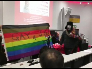 Masked volunteers carrying rainbow banner disrupt London event criticising abrogation of Article 370 in J&K Masked volunteers carrying rainbow banner disrupt London event criticising abrogation of Article 370 in J&K