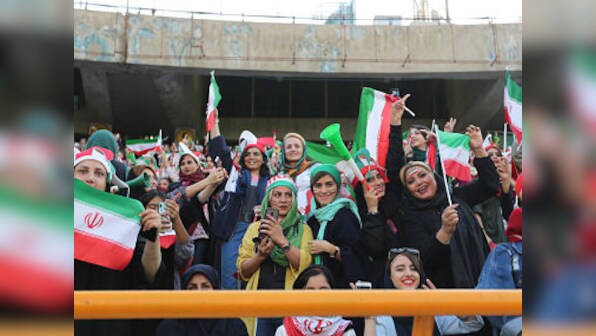 Iranian women attend first football match in 40 years after authorities open special stand