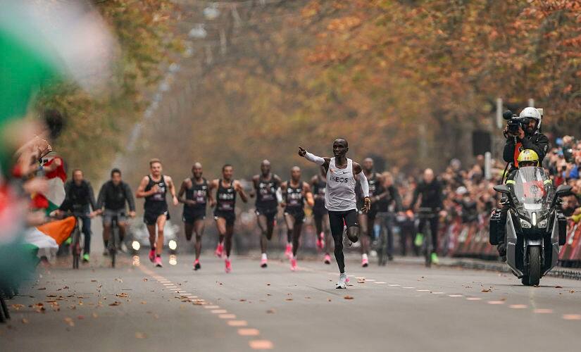 Eliud Kipchoge acknowledges the crowd right before he crosses the finish line during the Ineos 1:59 run in Vienna on Saturday. AP Photo