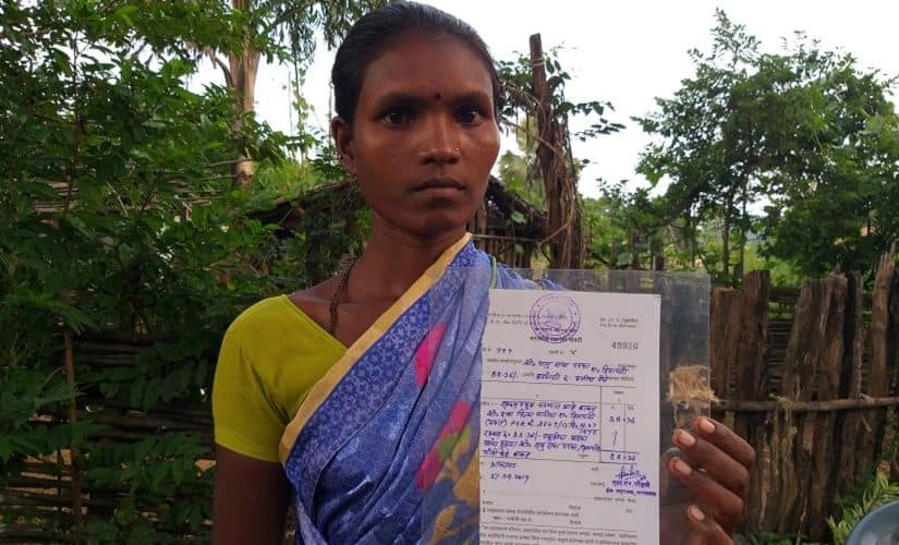 Kamli Parsa with her receipt for the Rs 88 fine she had to pay. Firstpost/Natasha Trivedi