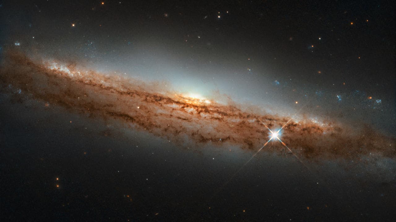 Hubble telescope captures a spiral galaxy 60 million light years away. image credit: NASA