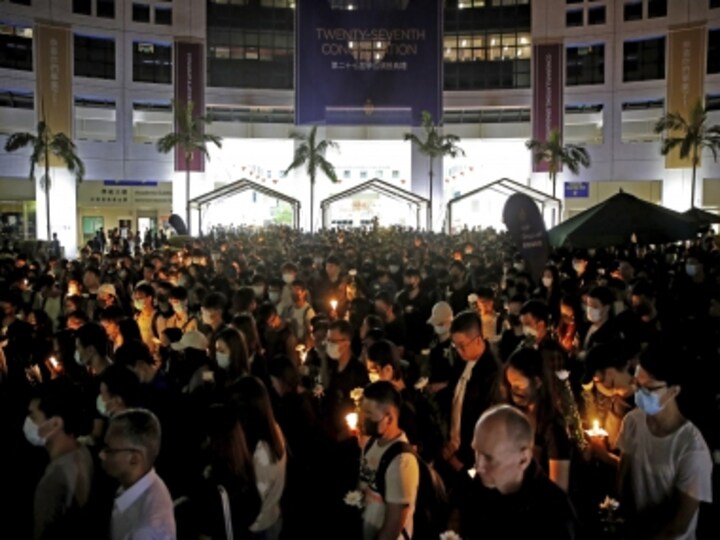 Thousands gather in Hong Kong to mourn student who died during recent clashes, oppose arrest of seven pro-democracy lawmakers