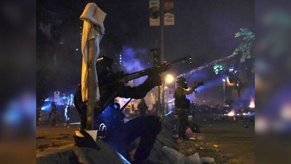 Police storms Hong Kong university held by anti-govt protestors; agitators set fire to bridges leading to campus, hurl gasoline bombs to hold off cops
