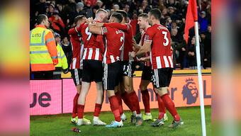Premier League: Sheffield United's Oli McBurnie scores late equaliser to deny Manchester United victory in six-goal thriller