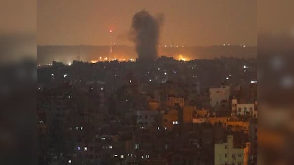 Palestinian militants fire rockets into Israel after air strike in Damascus leaves two members of Islamic Jihad group dead