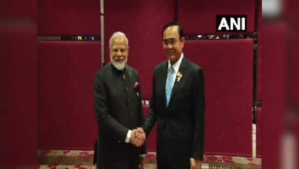 Narendra Modi meets Thailand's PM Prayut Chan-o-Cha on sidelines of 35th ASEAN summit, both leaders review progress in bilateral ties