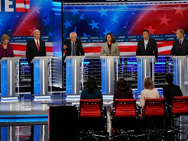 At Democratic debate, presidential contenders rebuke Donald Trump but vow not to be 'consumed' by him At Democratic debate, presidential contenders rebuke Donald Trump but vow not to be 'consumed' by him