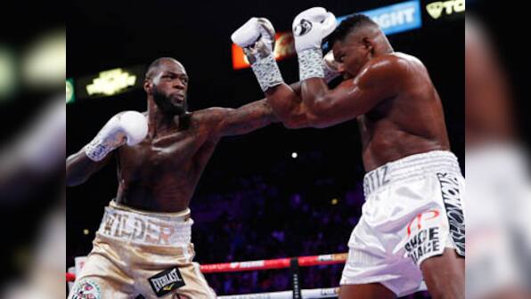 Deontay Wilder defeats Luis Ortiz with seventh-round knockout to retain heavyweight title ahead of Tyson Fury rematch