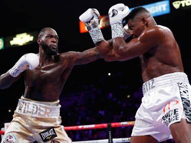 Deontay Wilder defeats Luis Ortiz with seventh-round knockout to retain heavyweight title ahead of Tyson Fury rematch
