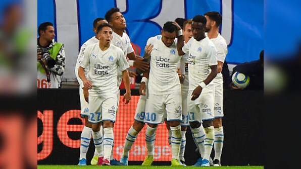 Ligue 1: Dimitri Payet's brace propels 10-man Marseille to narrow win over Lyon in violence-marred derby contest