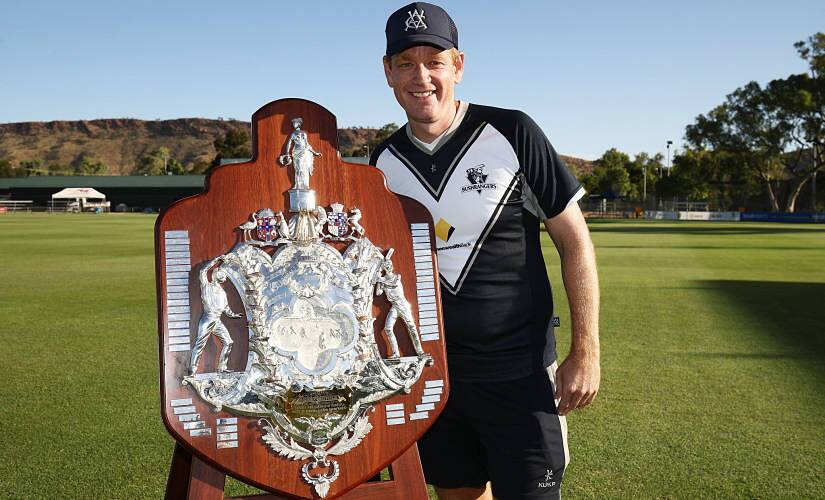 ALICE SPRINGS, AUSTRALIA - MARCH 30: Bushrangers coach, Andrew McDonald poses with the Sheffield Shield following the Sheffield Shield final between Victoria and South Australia on March 30, 2017 in Alice Springs, Australia. (Photo by Brendon Thorne/Getty Images)