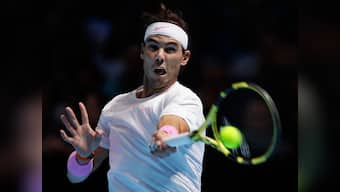 From domination of 'Big Three' in Grand Slams to Nadal powering Spain to victory in revamped Davis Cup Finals, the year in tennis