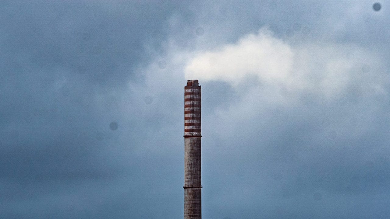 A thermal power plant’s chimney. Image credit: Kartik Chandramouli/Mongabay.
