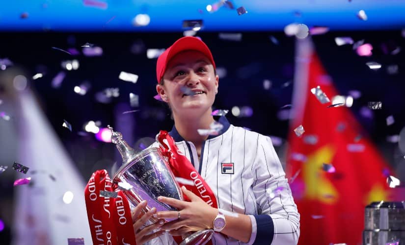Ashleigh Barty holds her winning trophy for the WTA Finals tournament, having beaten Elina Svitolina in the finals. AP