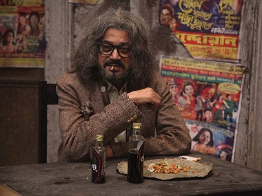 Buro Sadhu movie review: Debutant director Vik proves he's a fine craftsman with this richly detailed triumph Buro Sadhu movie review: Debutant director Vik proves he's a fine craftsman with this richly detailed triumph