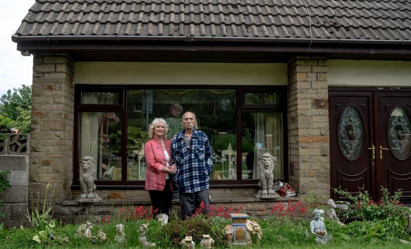 Shahid, Prince Cyrus’s older brother, and his wife, Camellia, outside their home in Bradford, England, 29 May, 2019. (Andrew Testa/The New York Times)