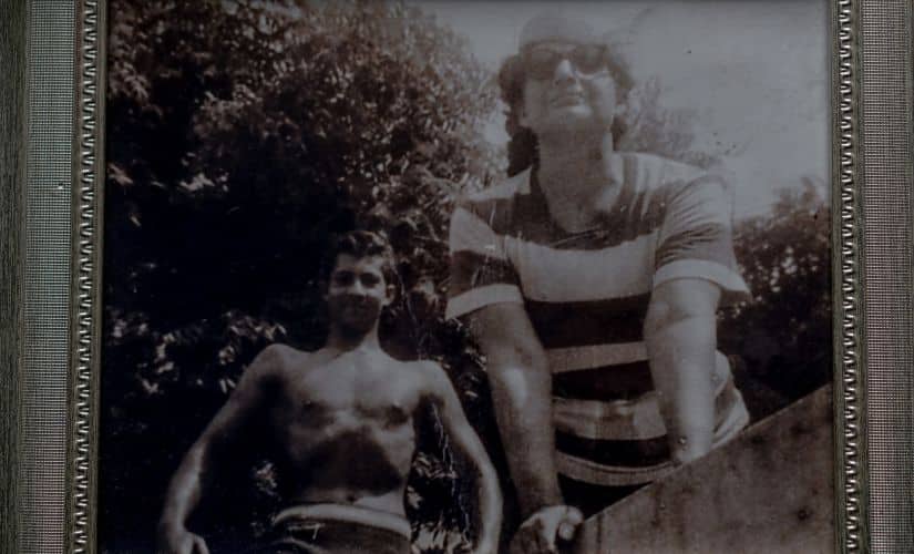 A family photo shows Shahid (left) Prince Cyrus’s older brother, and their mother, Wilayat, in Bradford, England, May 29, 2019. For 40 years, journalists chronicled the eccentric royal family of Oudh, deposed aristocrats who lived in a ruined palace in the Indian capital — a tragic, astonishing story, but was it true? (Andrew Testa/The New York Times)