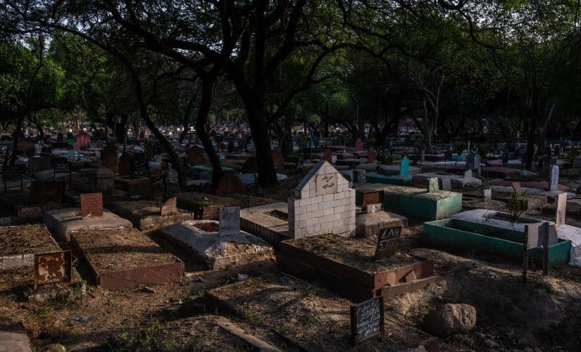 A cemetery in New Delhi where Prince Cyrus was buried as one of the unclamped dead, whose graves are marked only with chips of pink stone, 9 June, 2019 (Bryan Denton/The New York Times)