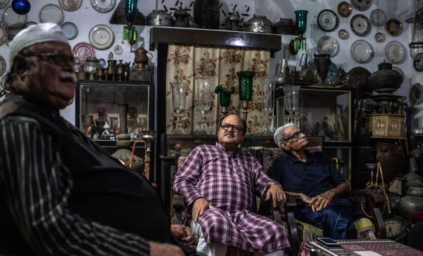 Sayyed Suleiman Naqvi, (far right), who said Prince Cyrus of Oudh and his family were imposters, in Lucknow, India, 24 August, 2019. For 40 years, journalists chronicled the eccentric royal family of Oudh, deposed aristocrats who lived in a ruined palace in the Indian capital — a tragic, astonishing story, but was it true? (Bryan Denton/The New York Times)