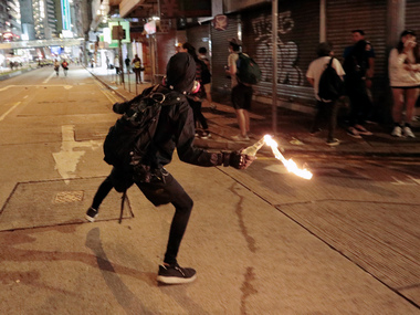 Hong Kong protests: Agitators attack Chinese news agency Xinhua's office; police fire tear gas to deter people from hurling gasoline bombs Hong Kong protests: Agitators attack Chinese news agency Xinhua's office; police fire tear gas to deter people from hurling gasoline bombs