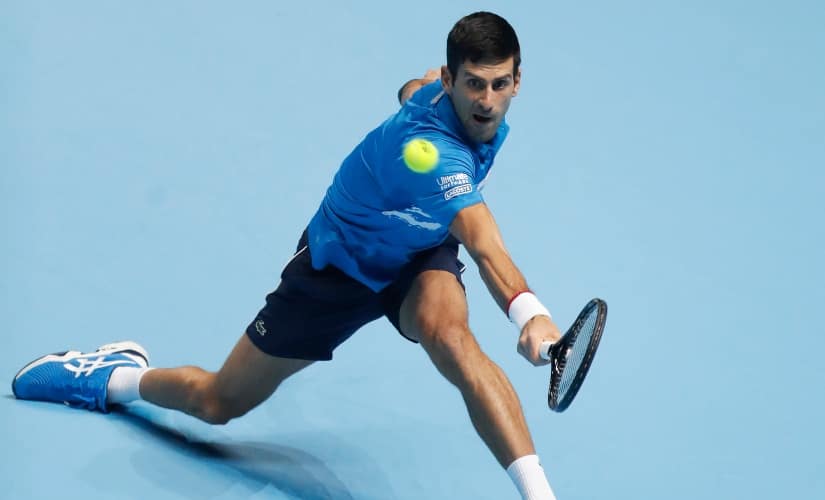 Serbia’s Novak Djokovic plays a return to Austria’s Dominic Thiem during their ATP World Tour Finals match. AP