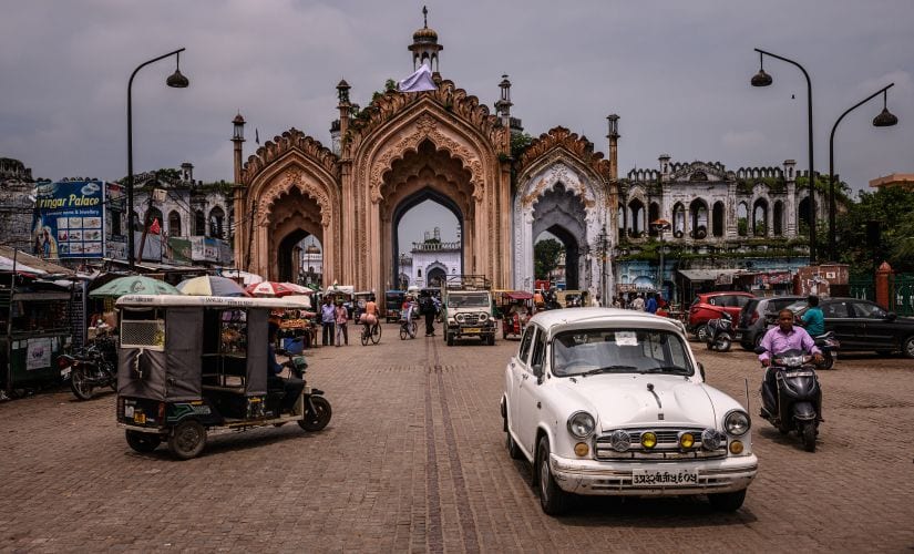Traffic moves through Lucknow, which is studded with shrines and palaces of Oudh nawabs, whose kingdom was annexed by the British in 1856, in India, Aug. 24, 2019. For 40 years, journalists chronicled the eccentric royal family of Oudh, deposed aristocrats who lived in a ruined palace in the Indian capital — a tragic, astonishing story, but was it true? (Bryan Denton/The New York Times)