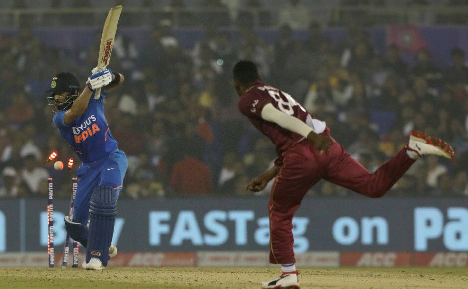 Virat Kohli chops on to his stumps off Keemo Paul's bowling to depart for 85. Sportzpics