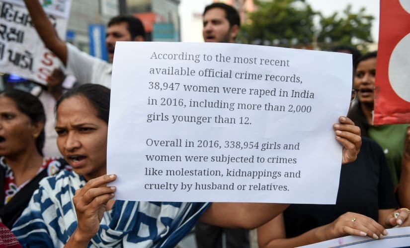 Demonstrators in Ahmedabad from All India Democratic Students Organisation (AIDSO), All India Mahila Sanskritik Students Organisation and citizens protest against rapes in Ranchi, Vadodara, Surat and other regions, following the Hyderabad rape case. Getty Images