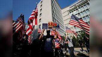 'Thank you Trump': Thousands take to Hong Kong streets to welcome US president signing pro-democracy legislation