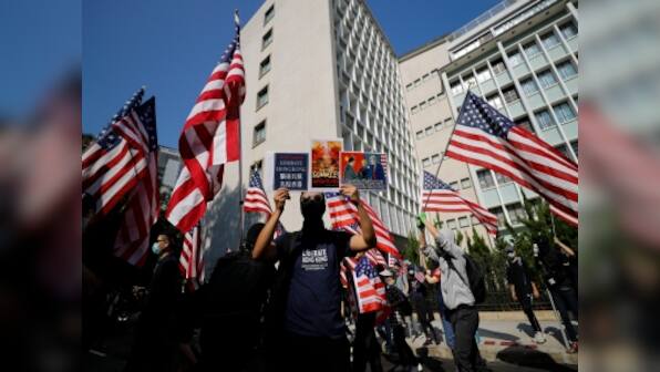 'Thank you Trump': Thousands take to Hong Kong streets to welcome US president signing pro-democracy legislation