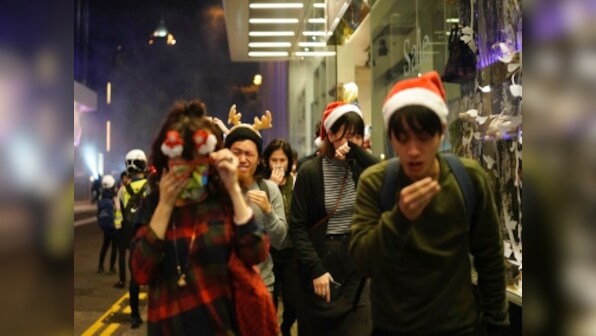 'It doesn't matter if it's Christmas': Hong Kong pro-democracy activists keep up protests as police fires tear gas to disperse crowds