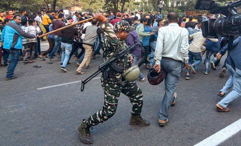 Police resort to baton charge to disperse protesters against the Citizenship (Amendment) Bill 2019 in Guwahati. PTI