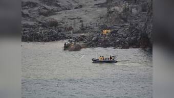 Six days after volcanic eruption in New Zealand's White Island, toxic gases, low visibility hamper search for victims