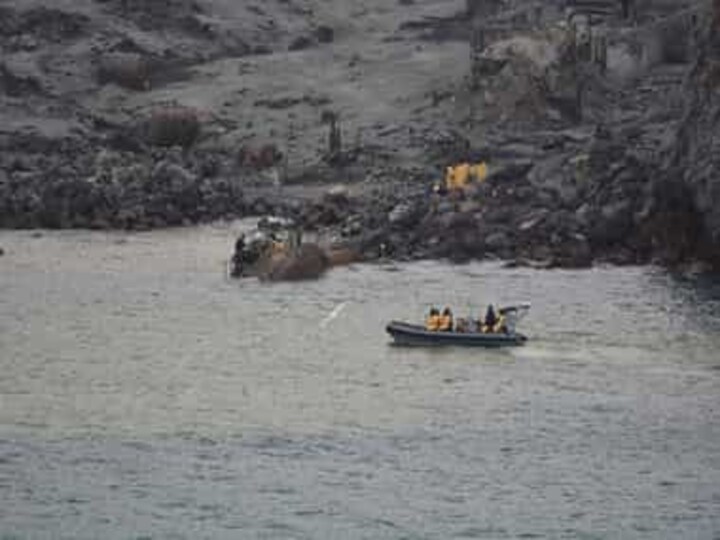 Six days after volcanic eruption in New Zealand's White Island, toxic gases, low visibility hamper search for victims