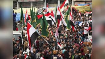 Hundreds in Baghdad protest devaluation of Iraq’s currency
