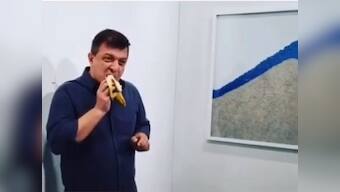 American artist David Datuna eats Art Basel Miami's duct-taped banana artwork worth $150,000, uploads video on social media