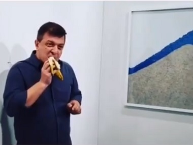 American artist David Datuna eats Art Basel Miami's duct-taped banana artwork worth $150,000, uploads video on social media American artist David Datuna eats Art Basel Miami's duct-taped banana artwork worth $150,000, uploads video on social media