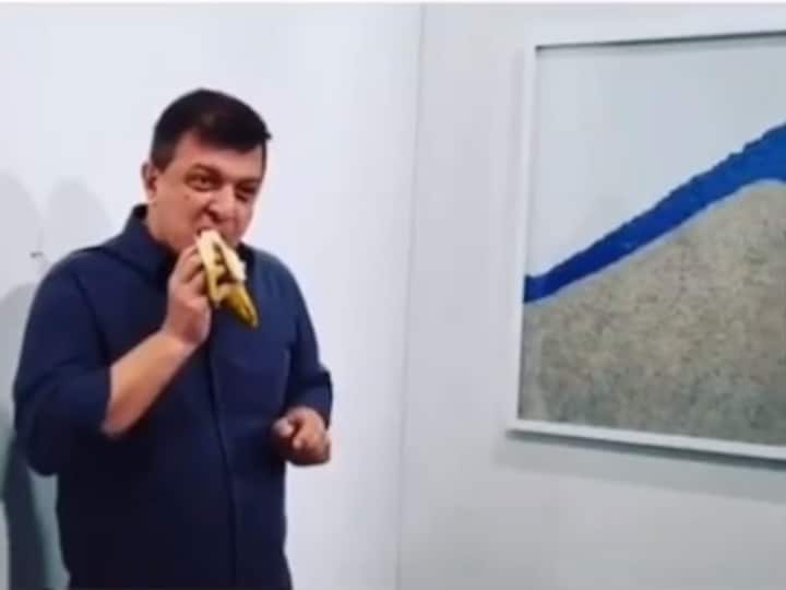 American artist David Datuna eats Art Basel Miami's duct-taped banana artwork worth $150,000, uploads video on social media