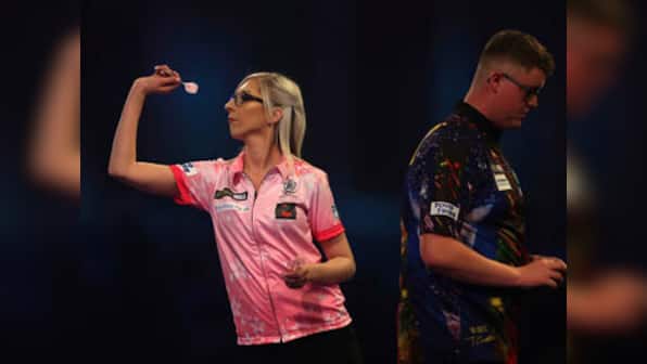 Trailblazing Fallon Sherrock becomes first-ever female darts player to win at PDC World Championship