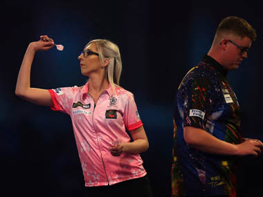 Trailblazing Fallon Sherrock becomes first-ever female darts player to win at PDC World Championship Trailblazing Fallon Sherrock becomes first-ever female darts player to win at PDC World Championship