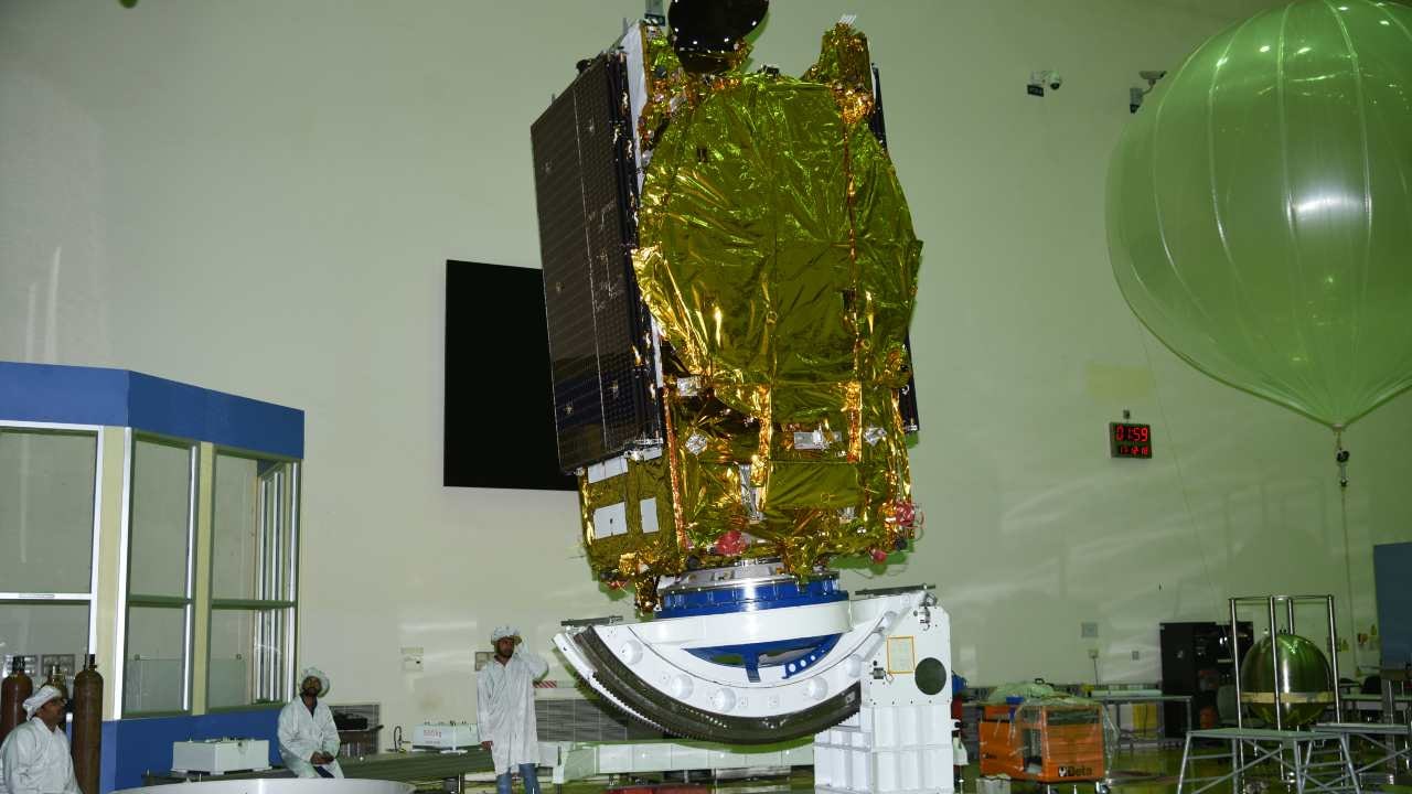 GSAT-31 in the middle of a centre of gravity test. Image: ISRO