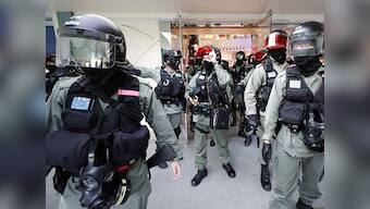 Hong Kong Police use pepper spray, arrest 12 as protesters target shopping mall near border with China